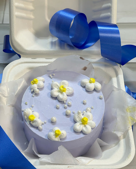 Light Purple Floral Cake with White and Yellow Buttercream Flowers | Doon Memories
