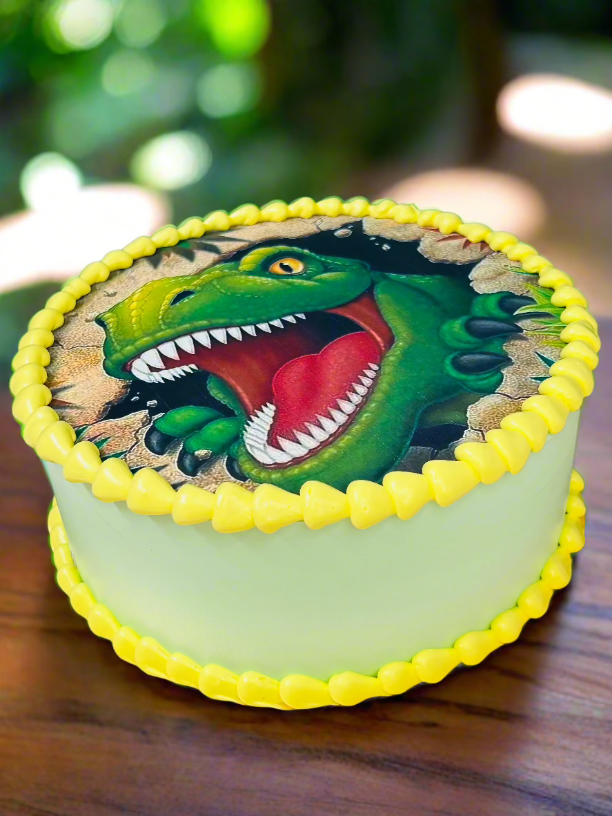 Dinosaur-Themed Cake with Edible Print and Yellow Piping Border | Doon Memories