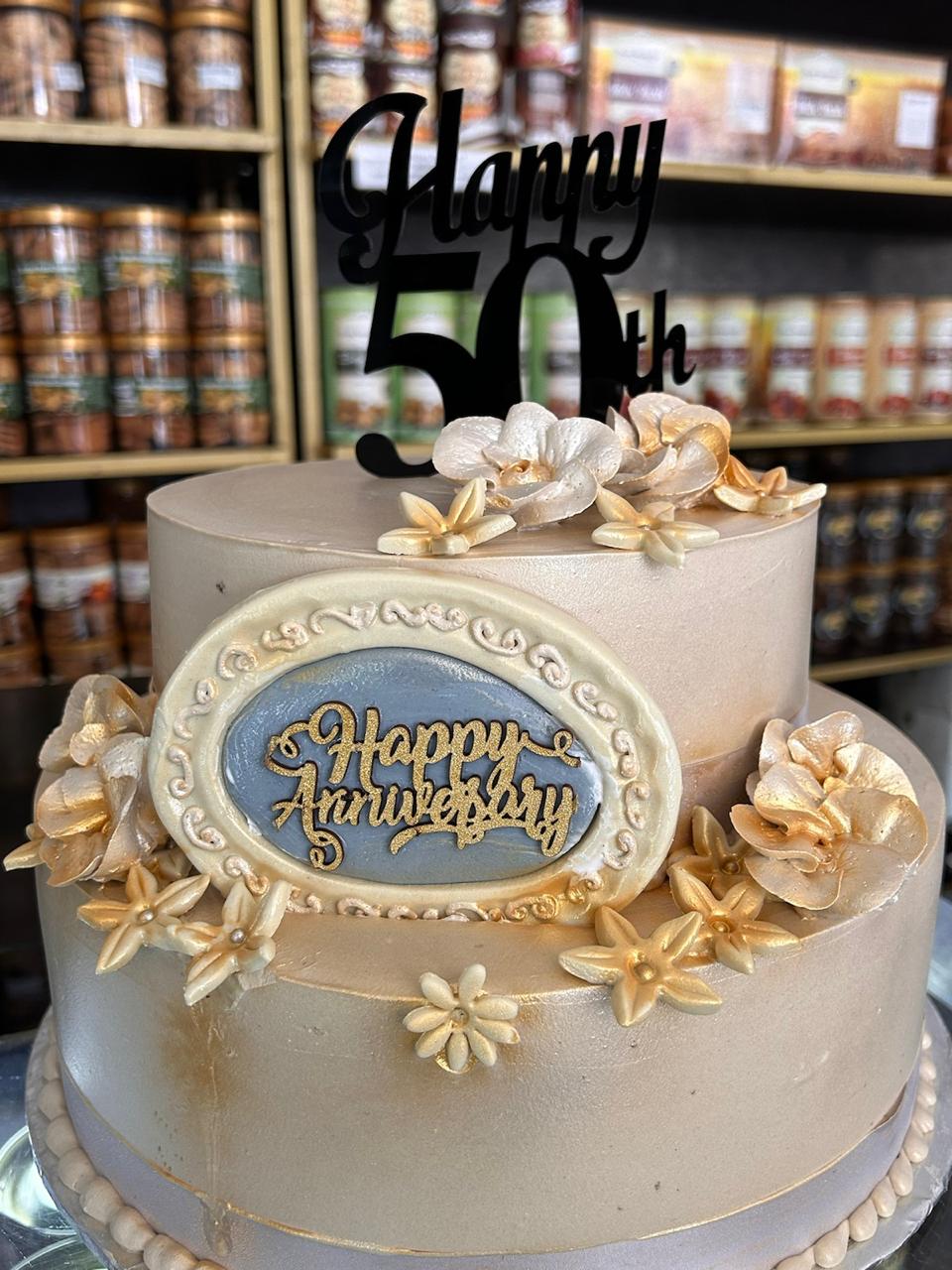 50th Anniversary Soft Pink Buttercream Flowers Cake | Doon Memories