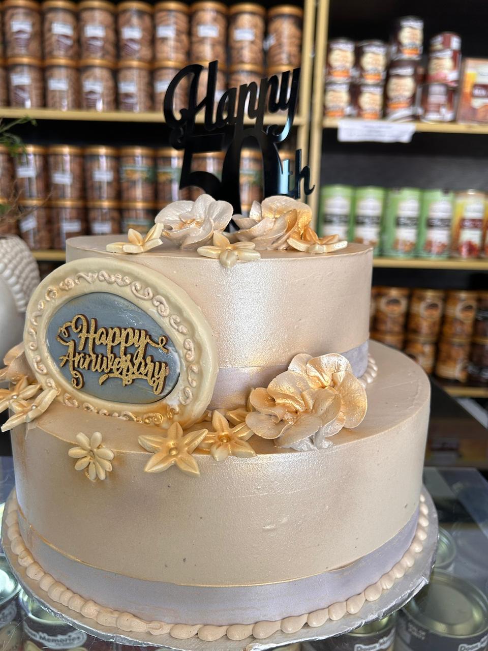 50th Anniversary Soft Pink Buttercream Flowers Cake | Doon Memories