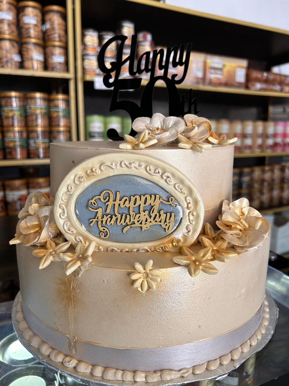 50th Anniversary Soft Pink Buttercream Flowers Cake | Doon Memories
