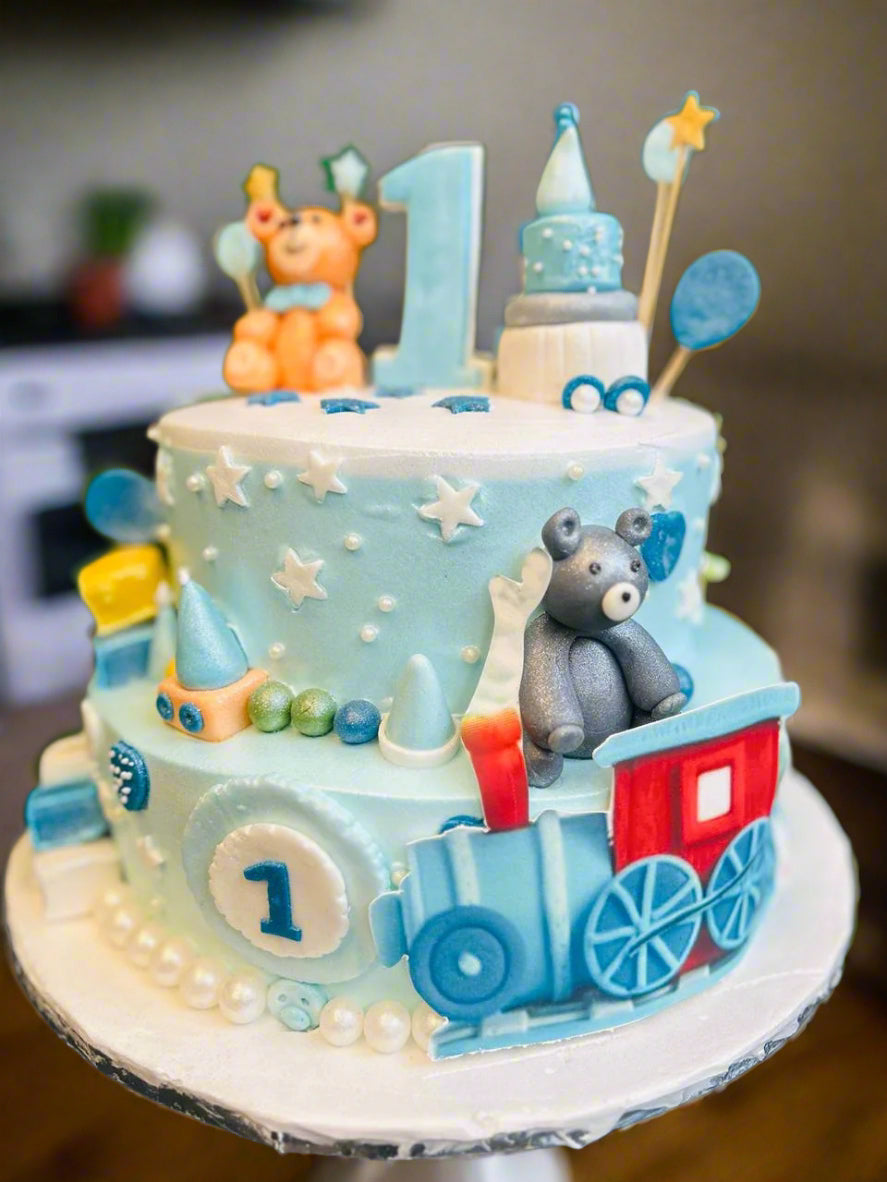 Tiered Fondant Vanilla Blue & White Teddy Bear Train-Themed Cake | Doon Memories