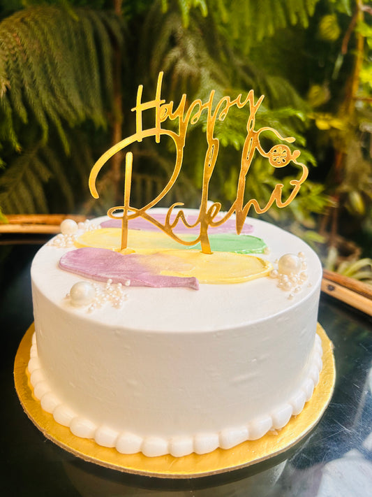 Elegant Rakhi Brushstroke Cake.