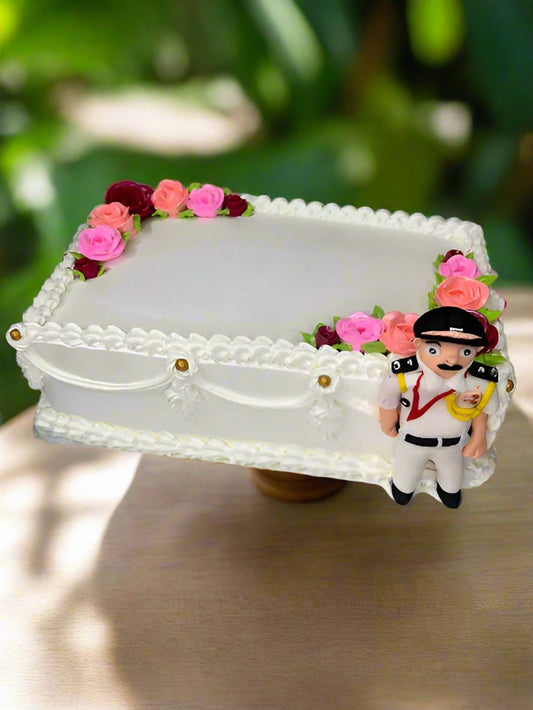 Uniformed Figurine Elegant White Base Cake | Doon Memories